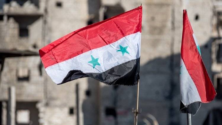 Сирийский флаг подняли над госучреждениями в городах Хасеке и Камышли