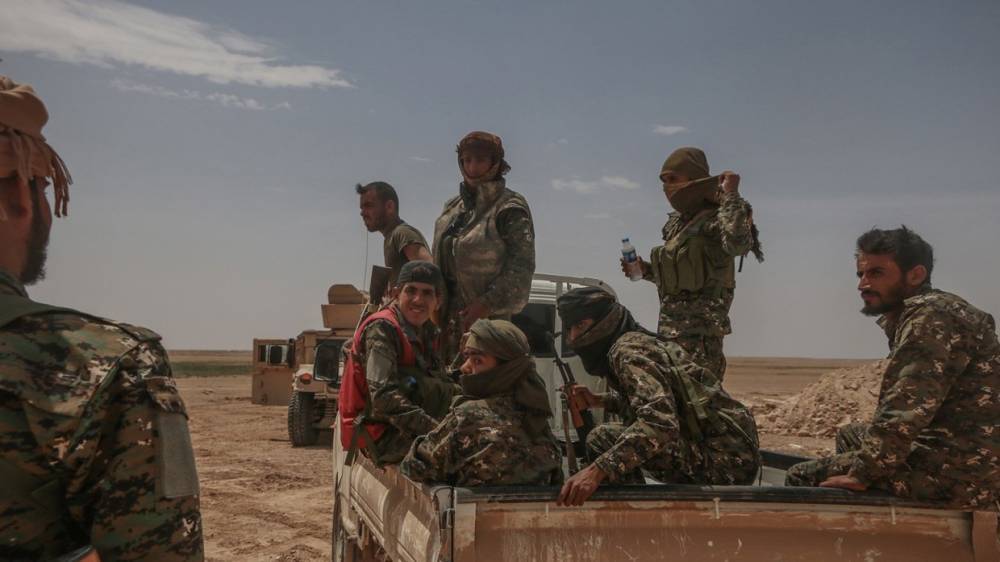 МИД Турции заявил, что курдские боевики покинут северные районы Сирии без вооружения