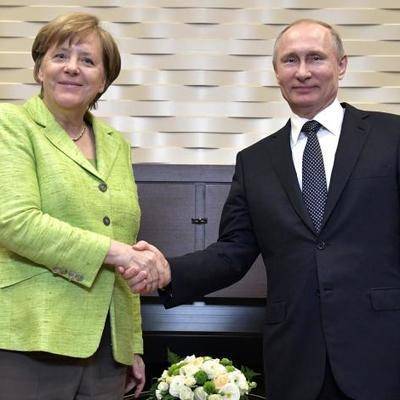 Путин и Меркель подтвердили важность выполнения минского "Комплекса мер"
