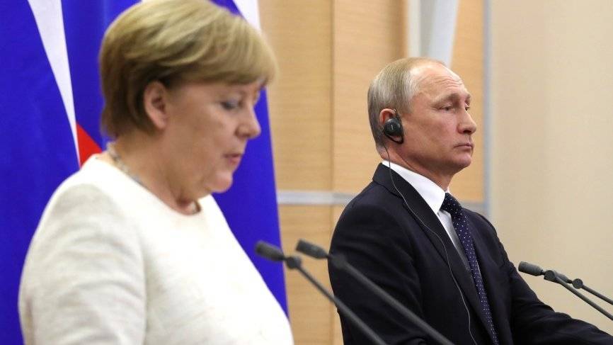 Путин и Меркель отметили важность выполнения Минских соглашений по Украине