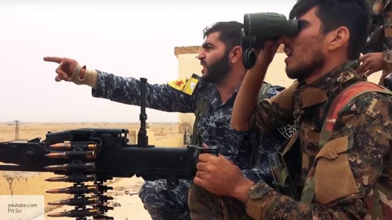 Курдские боевики заявили, что сбили турецкий вертолет в районе города Тель-Абъяд