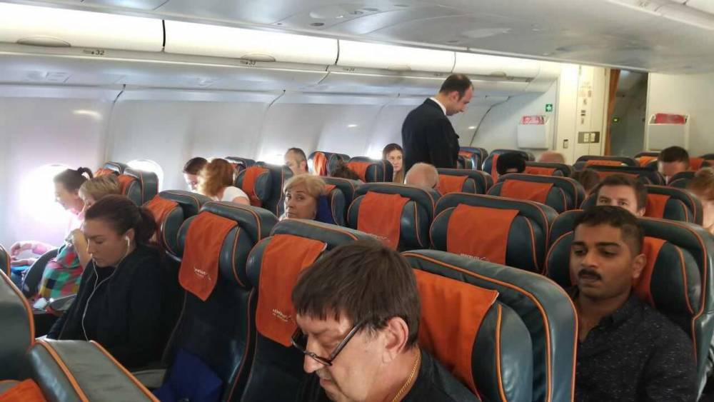 Фото Марии Бутиной в самолете перед вылетом в Москву