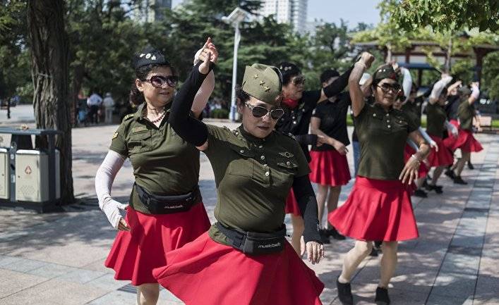 Жэньминь жибао (Китай): почему китайцы так любят танцы на площади?