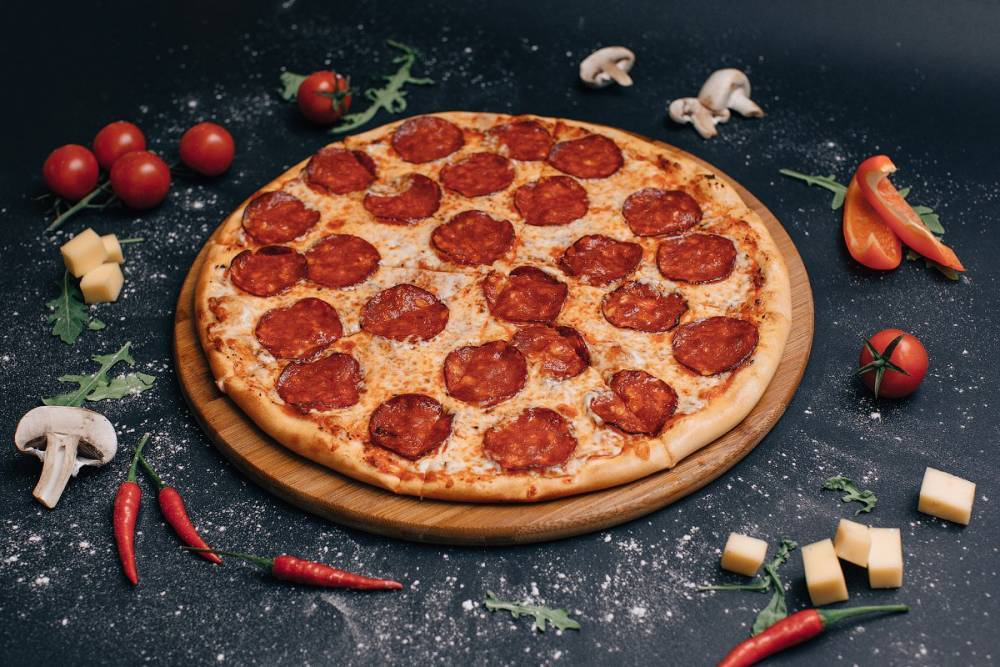 Пальчики оближешь: правильный соус для домашней пиццы и две начинки, что сделают ее по- настоящему итальянской