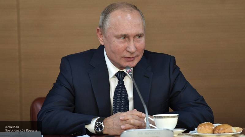 Путин призвал Кабмин и администрацию сделать прививки от гриппа по его примеру