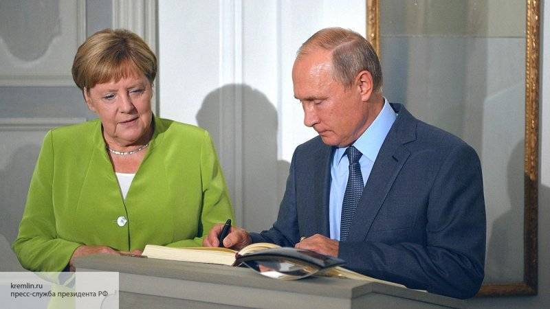 Путин и Меркель обсудят по телефону Сирию, Ливию и Украину