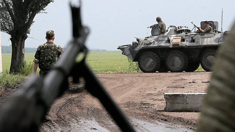 В Донбассе началось разведение войск