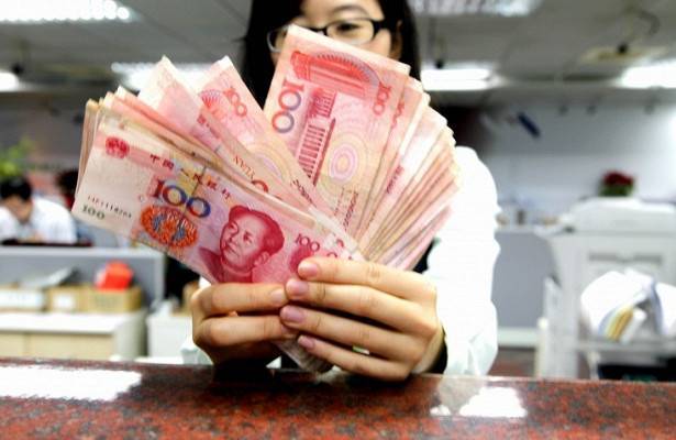 Центробанк Китая повысил курс юаня к доллару до максимума за три месяца