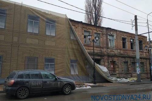Омские дома отремонтировали за 1 млрд рублей и завесили баннерами к приезду Путина