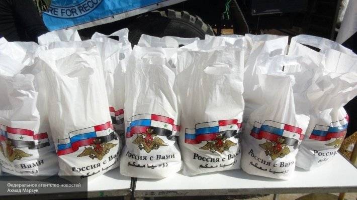 Жители сирийской Пальмиры приняли гуманитарную помощь российских военных