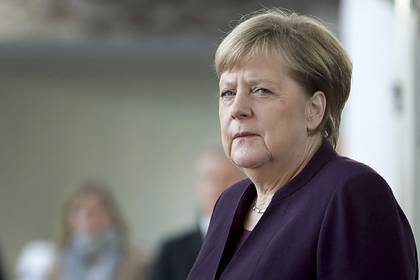 Меркель назвала Путина победителем на саммите в Париже