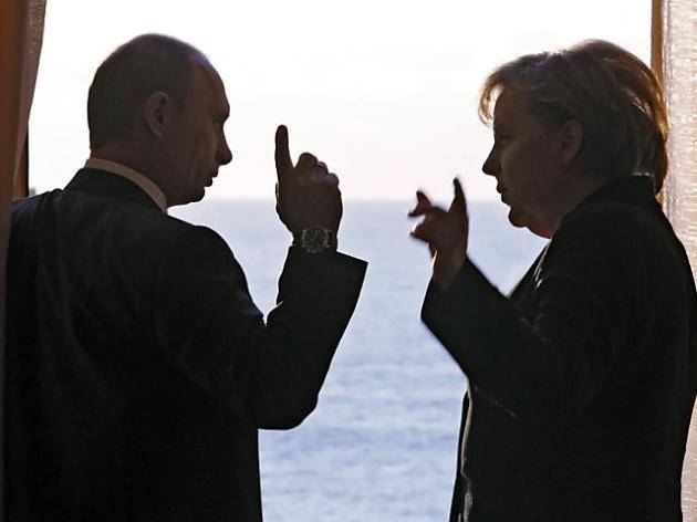 Меркель назвала Путина победителем на парижском саммите