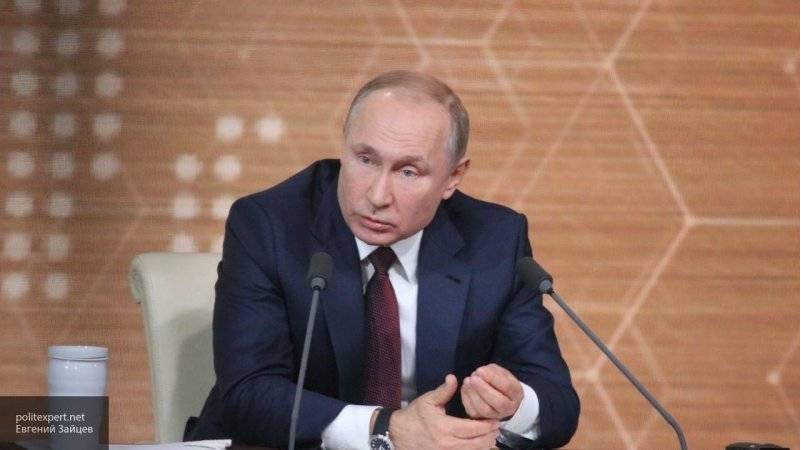 Олимпийская сборная России должна выступать под своим флагом – Путин
