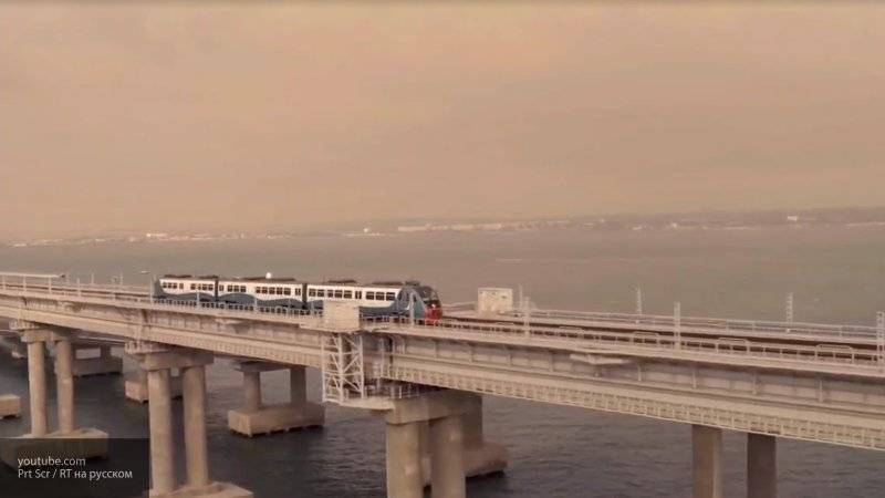 Открытие Крымского моста стало примером для всего мира, заявил политолог