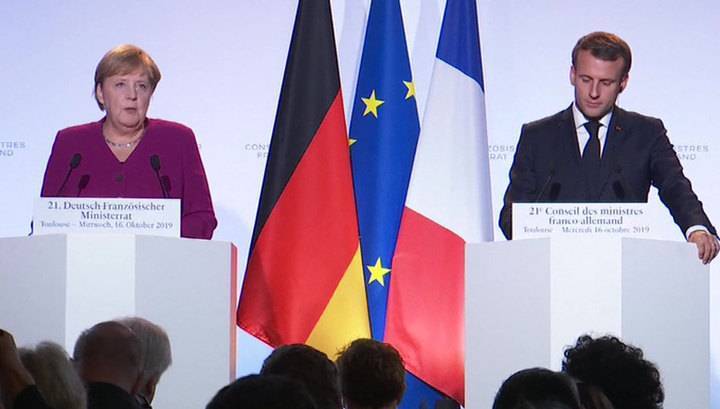 Меркель и Макрон назвал обмен пленными "положительным шагом"