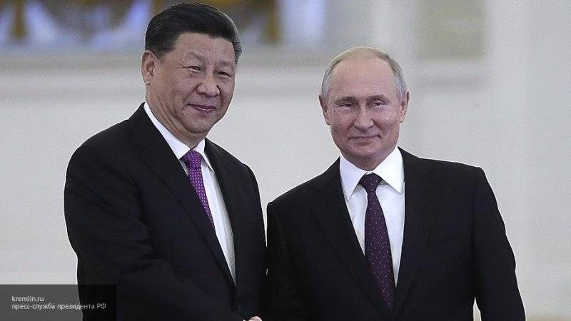 Си Цзиньпин поздравил Путина и россиян с наступающим Новым годом