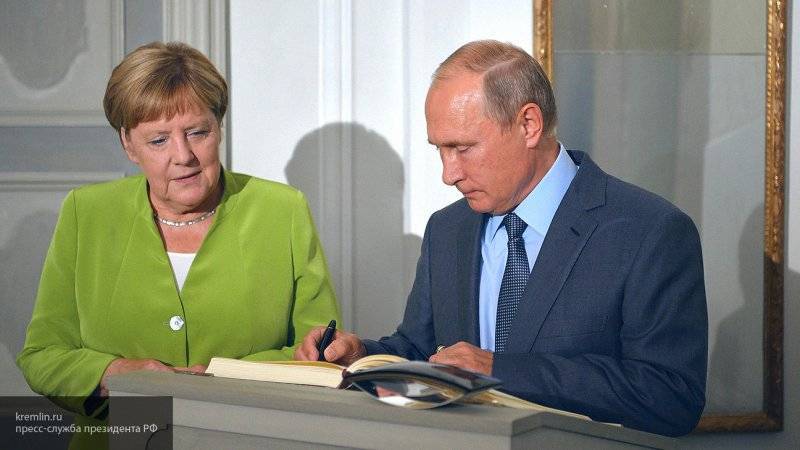 Меркель намерена провести встречу с Путиным на полях "нормандского саммита" в Париже
