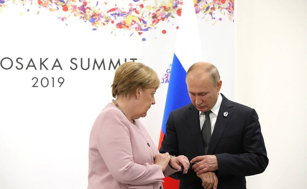 Меркель в Париже переговорит с Путиным с глазу на глаз