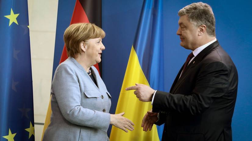 Порошенко и Меркель обсудили выдачу паспортов России в Донбассе