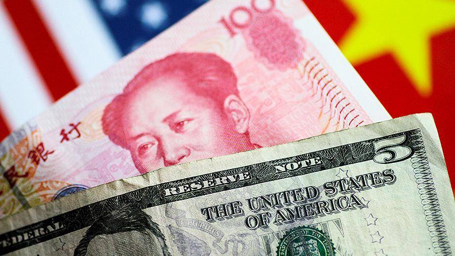 ЦБ Китая понизил курс юаня по отношению к доллару