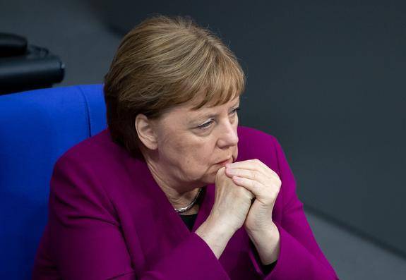 Ангела Меркель - Тереза Мэй - Мартин Фиц - Меркель отреагировала на информацию об отставке Мэй - argumenti.ru - Англия - Германия - Премьер