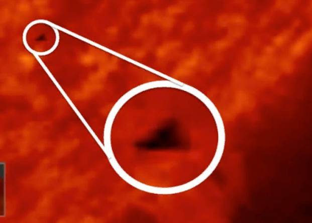 Гигантский НЛО в форме треугольника замечен вращающимся вокруг Солнца