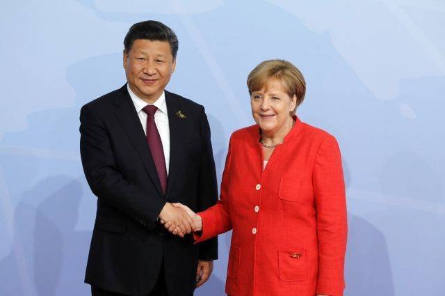 Меркель и Си Цзиньпин выступили за сохранение ядерной сделки по Ирану