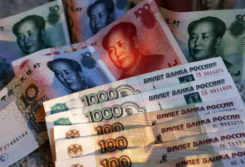 Доллар лишний: Россия и Китай договорились о расчетах в рублях и юанях