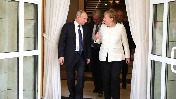 Путин побеседовал с Меркель на саммите G20