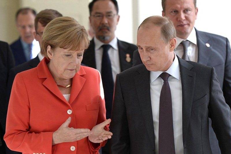 Путин "на ногах" переговорил с Меркель