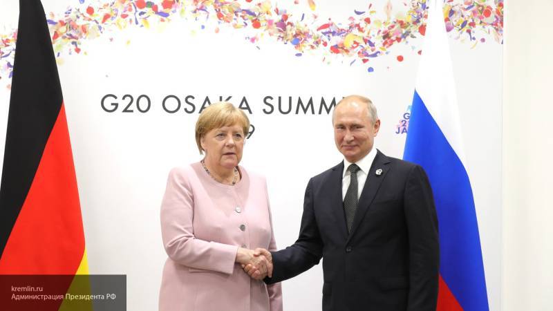 Путин и Меркель договорились о продолжении работы в нормандском формате