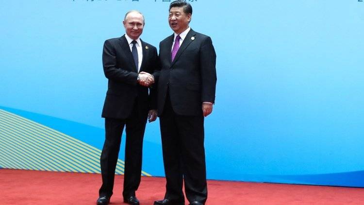 Ушаков рассказал о запланированных на 5 июня переговорах Путина и Си Цзиньпина