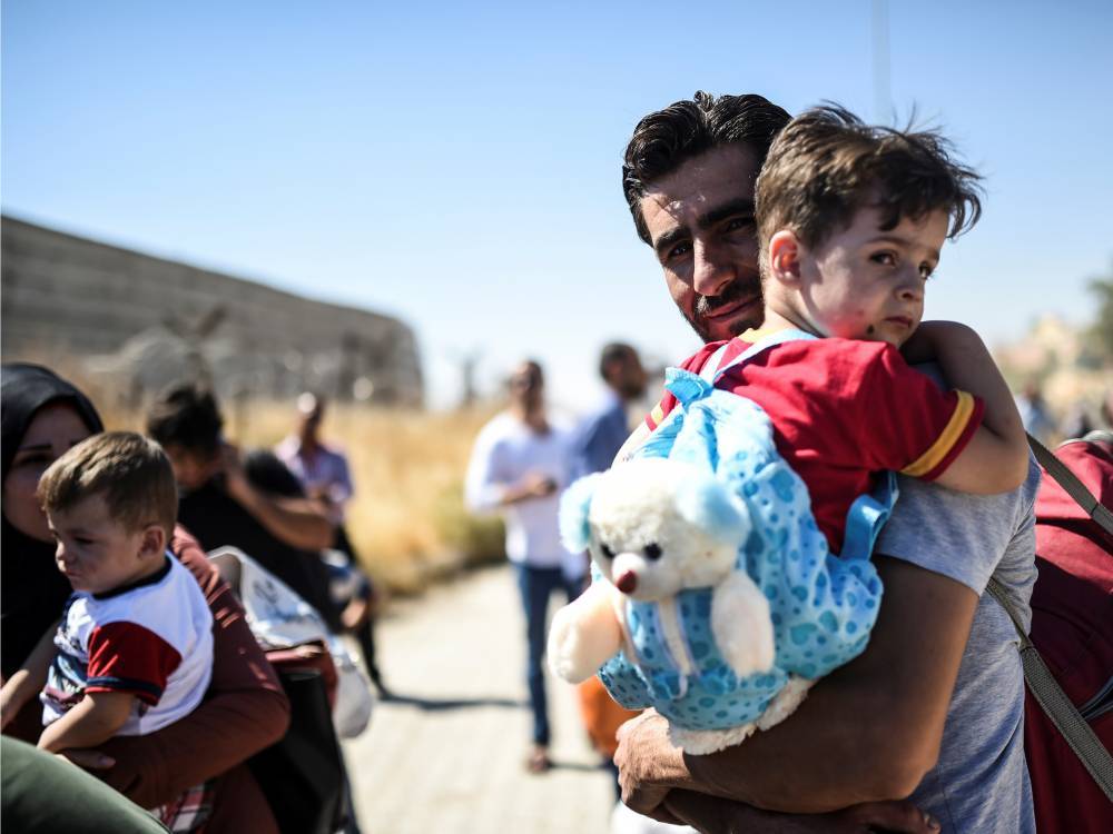 Минобороны РФ: больше 900 беженцев вернулись в Сирию 9 июня
