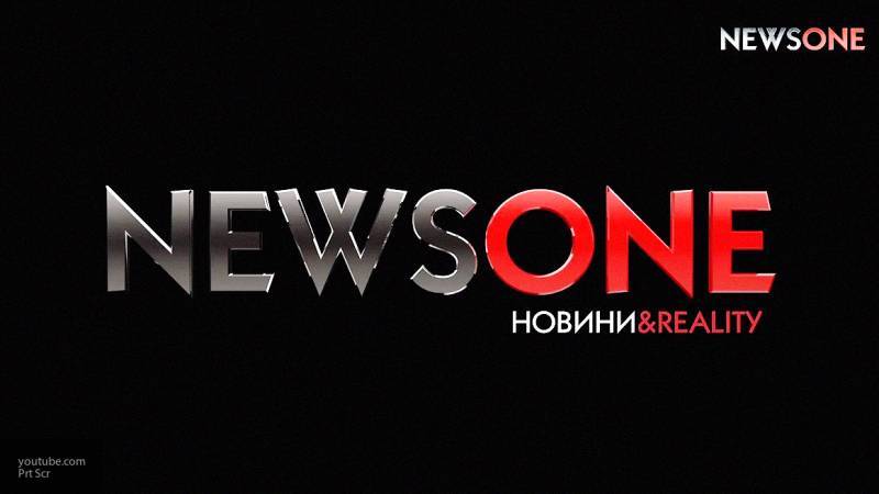 Акция в поддержку журналистов украинского телеканала NewsOne проходит в Киеве