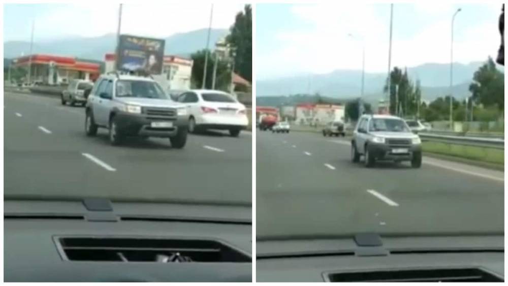 Едущий задом наперед автомобиль попал на видео в Алматы