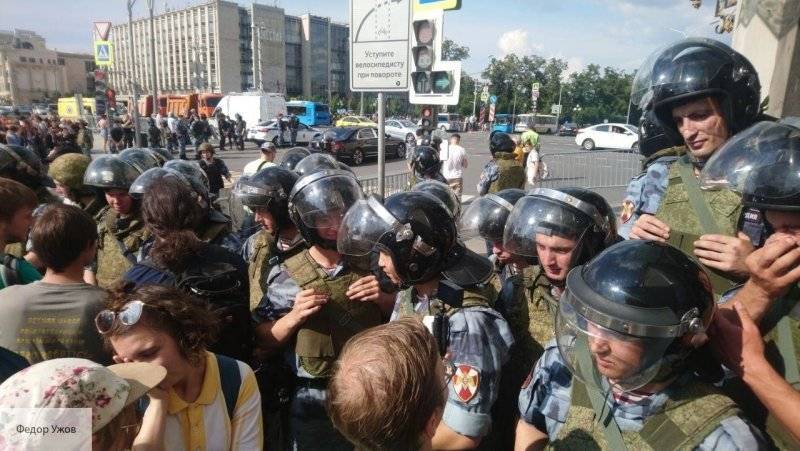 У организаторов столкновений с полицией на митинге 27 июля проходят обыски