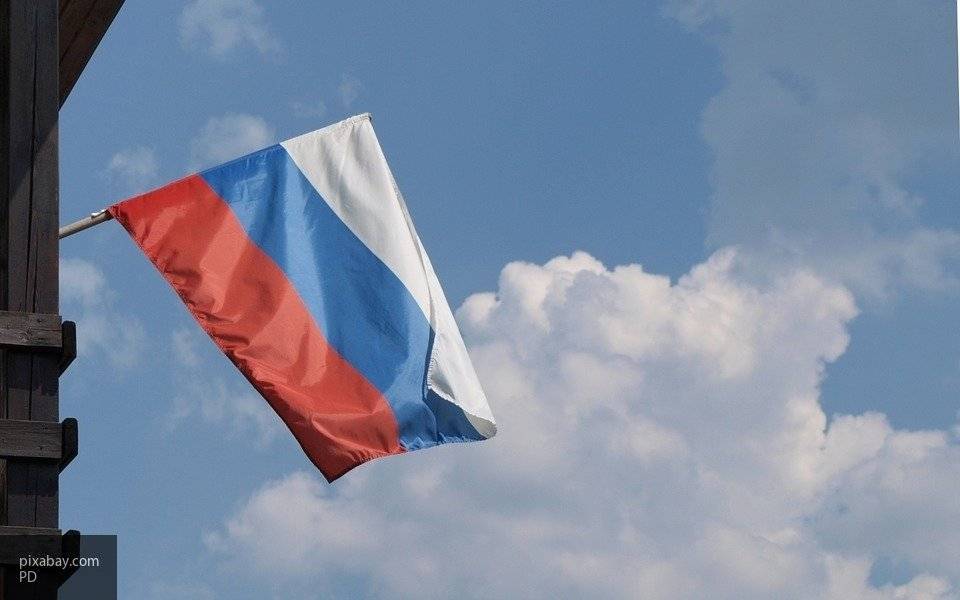 Опубликовано видео, на котором россияне развернули в центре Москвы флаг РФ