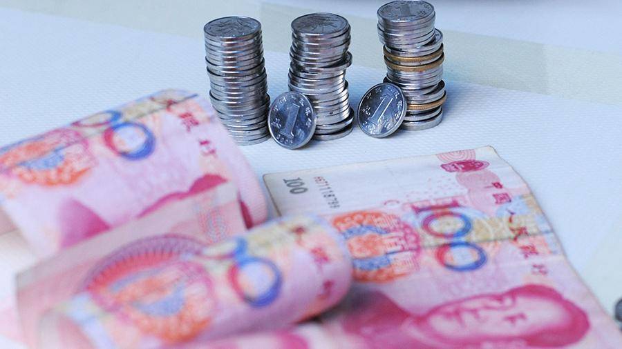 Китай вновь рекордно опустил курс юаня к доллару