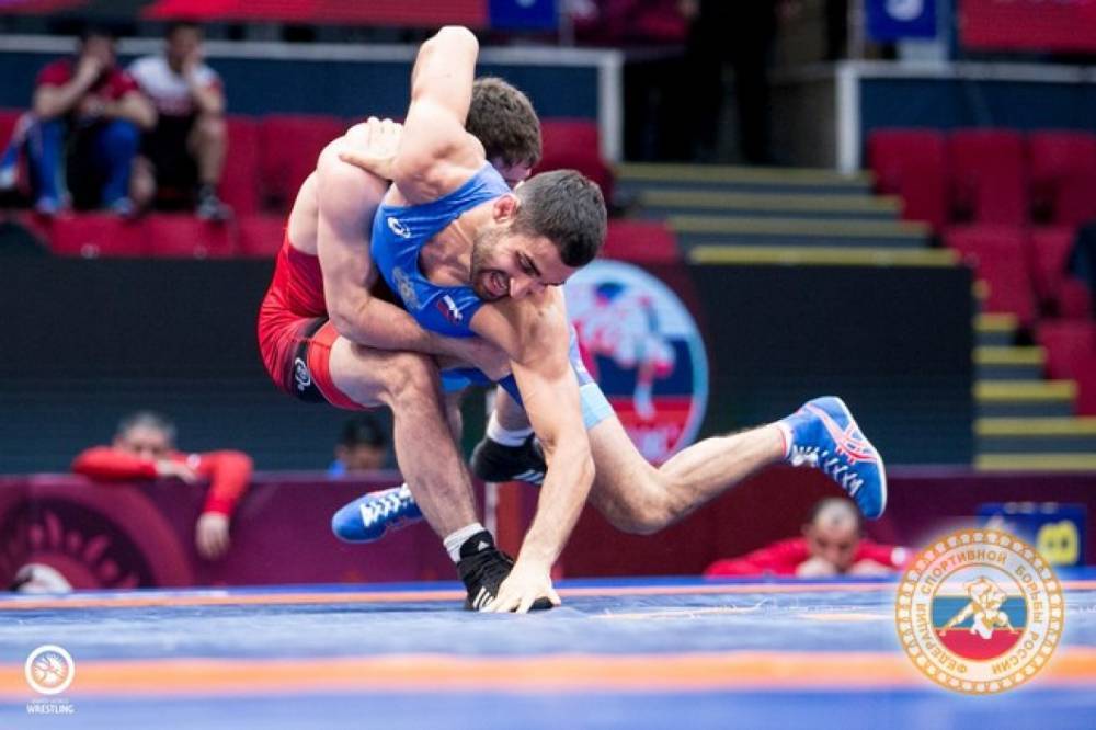 Российские спортсмены Баев и Сидаков взяли золото на чемпионате мира по борьбе