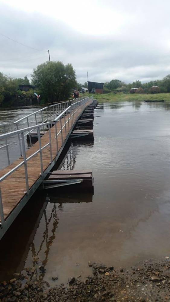 Строители восстановили мост в Филькино