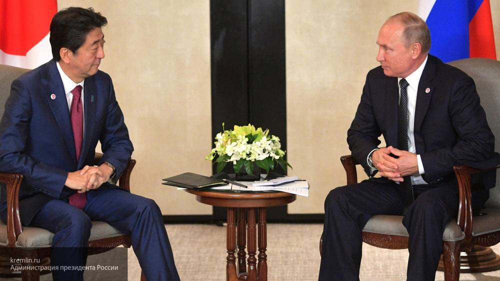 Путин поблагодарил премьера Японии за сочувствие пострадавшим в Сибири