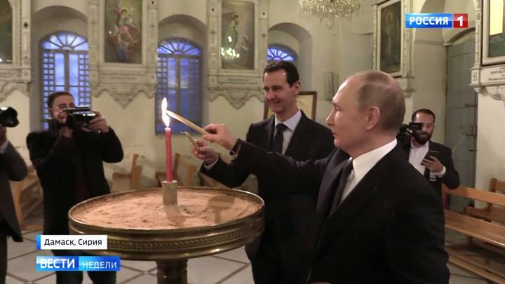 Путин и Асад поставили свечки за мир