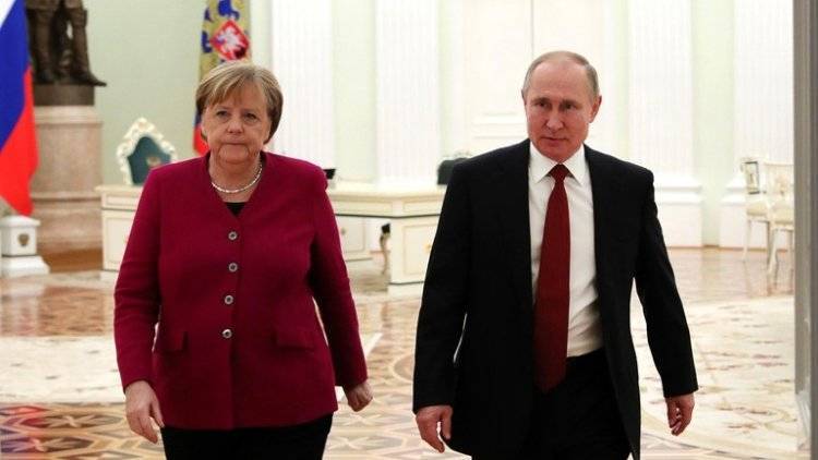 Путин и Меркель обсудили межливийское урегулирование
