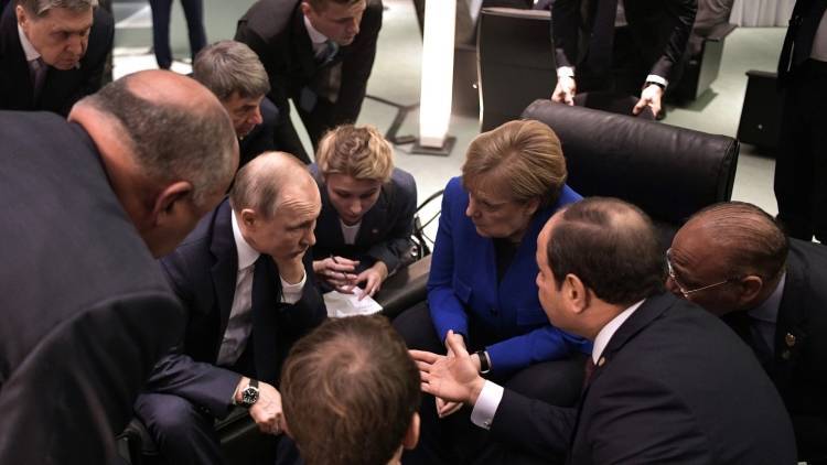 Путин сыграл центральную роль на берлинской конференции по Ливии