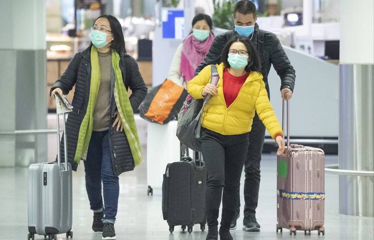 Японских туристов поместят на 14-дневный карантин после возвращения из КНР
