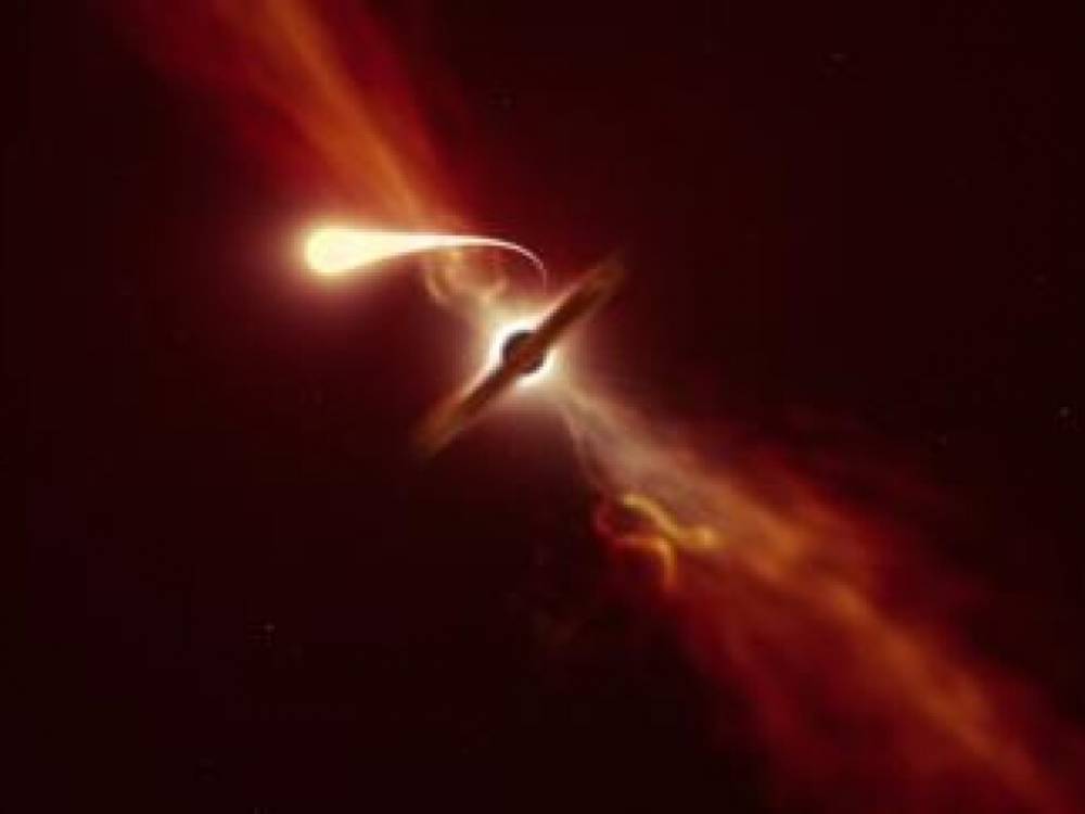 Астрономы показали взрыв звезды, которую «поедает» черная дыра