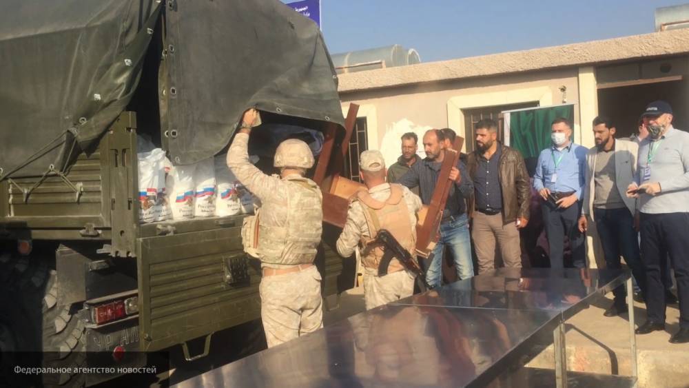 Сирийские беженцы под Дамаском получили гуманитарную помощь от РФ