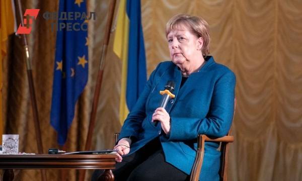 Меркель предупредила о третьей волне COVID зимой