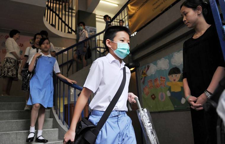 В Шанхае из-за вспышки коронавируса школьников будут обучать удалённо