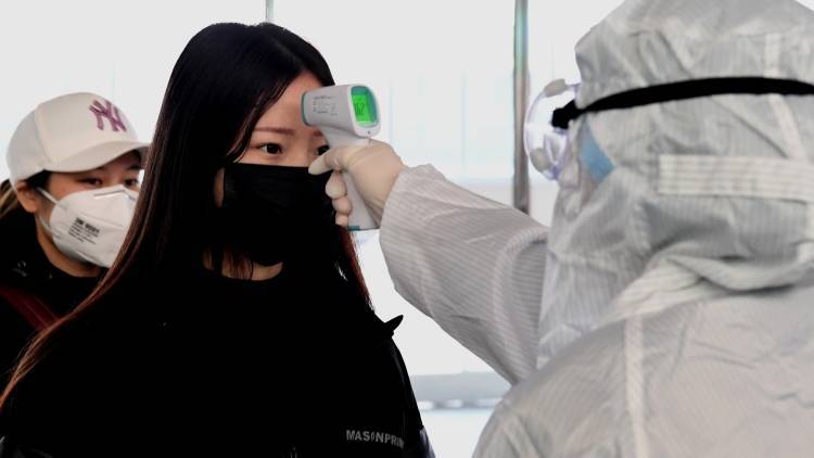 Число заразившихся новым коронавирусом в Японии достигло тысячи